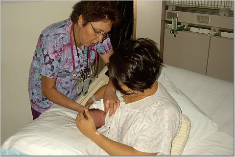 Nurse Maria gives Kimi some lactation advice